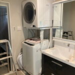 専用台（高）を置いて、専用台の上にガス衣類乾燥機　RDT-63　を新規設置